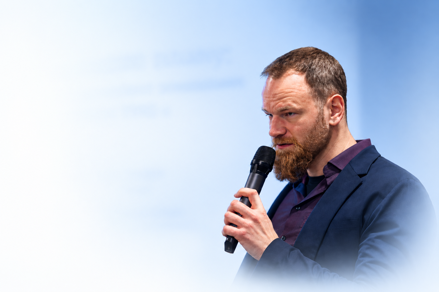 Greg Yudin speaking at a public event